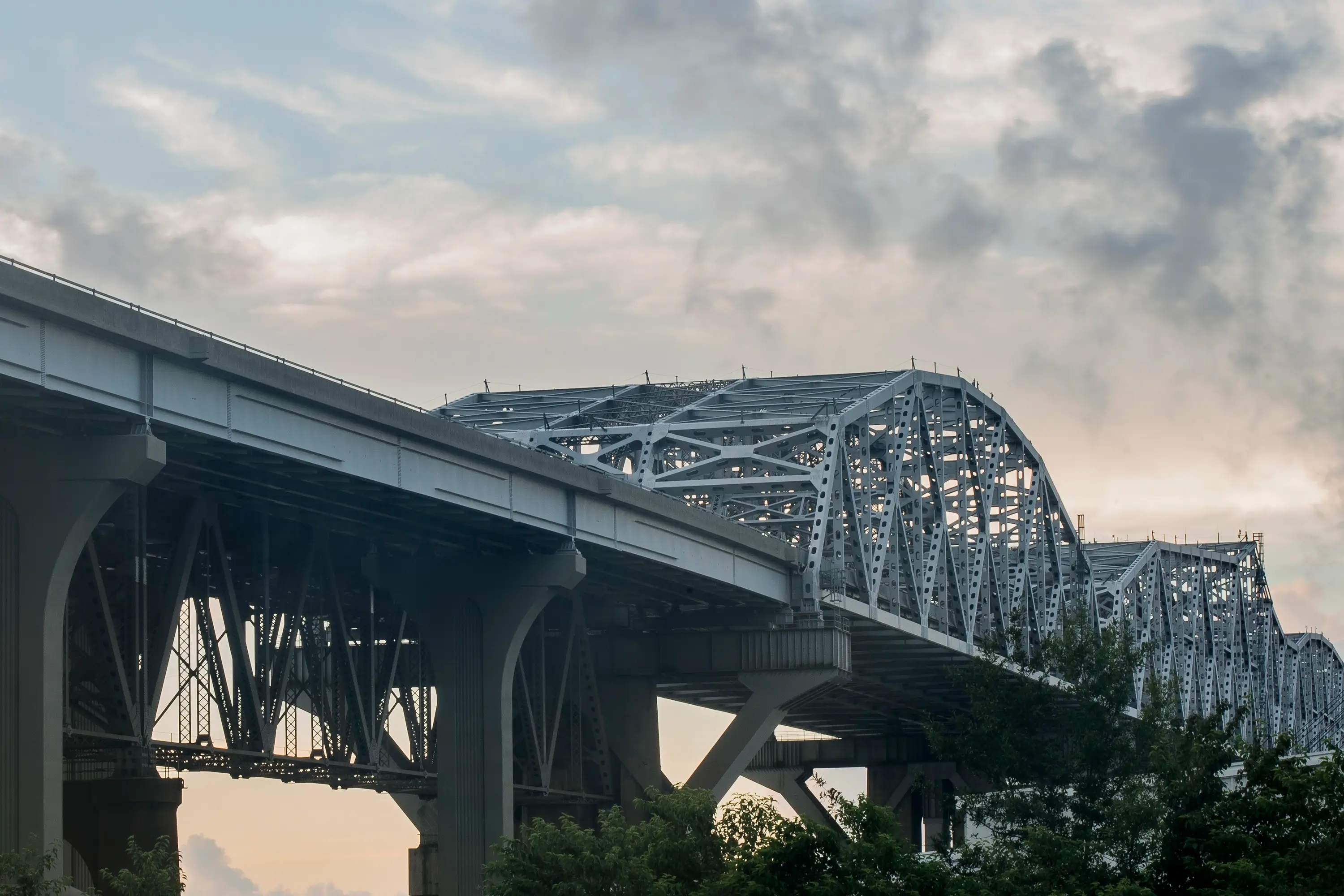 The Huey P. Long bridge at sunset