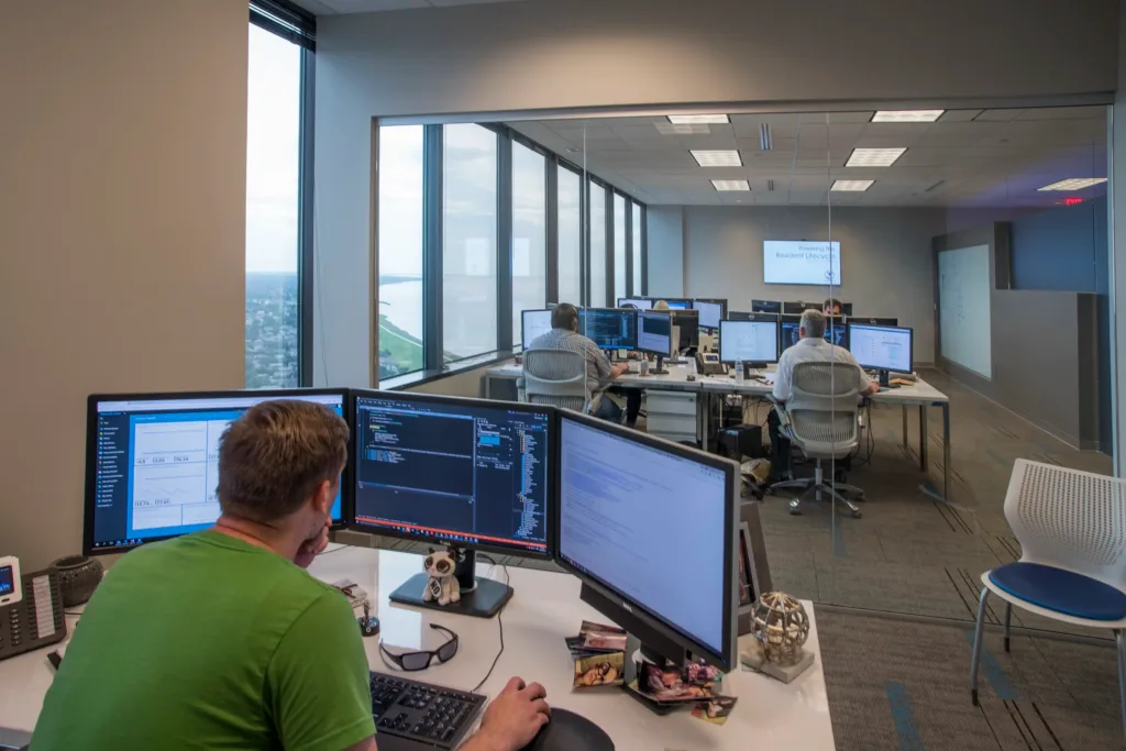 People sitting at desks working in an office