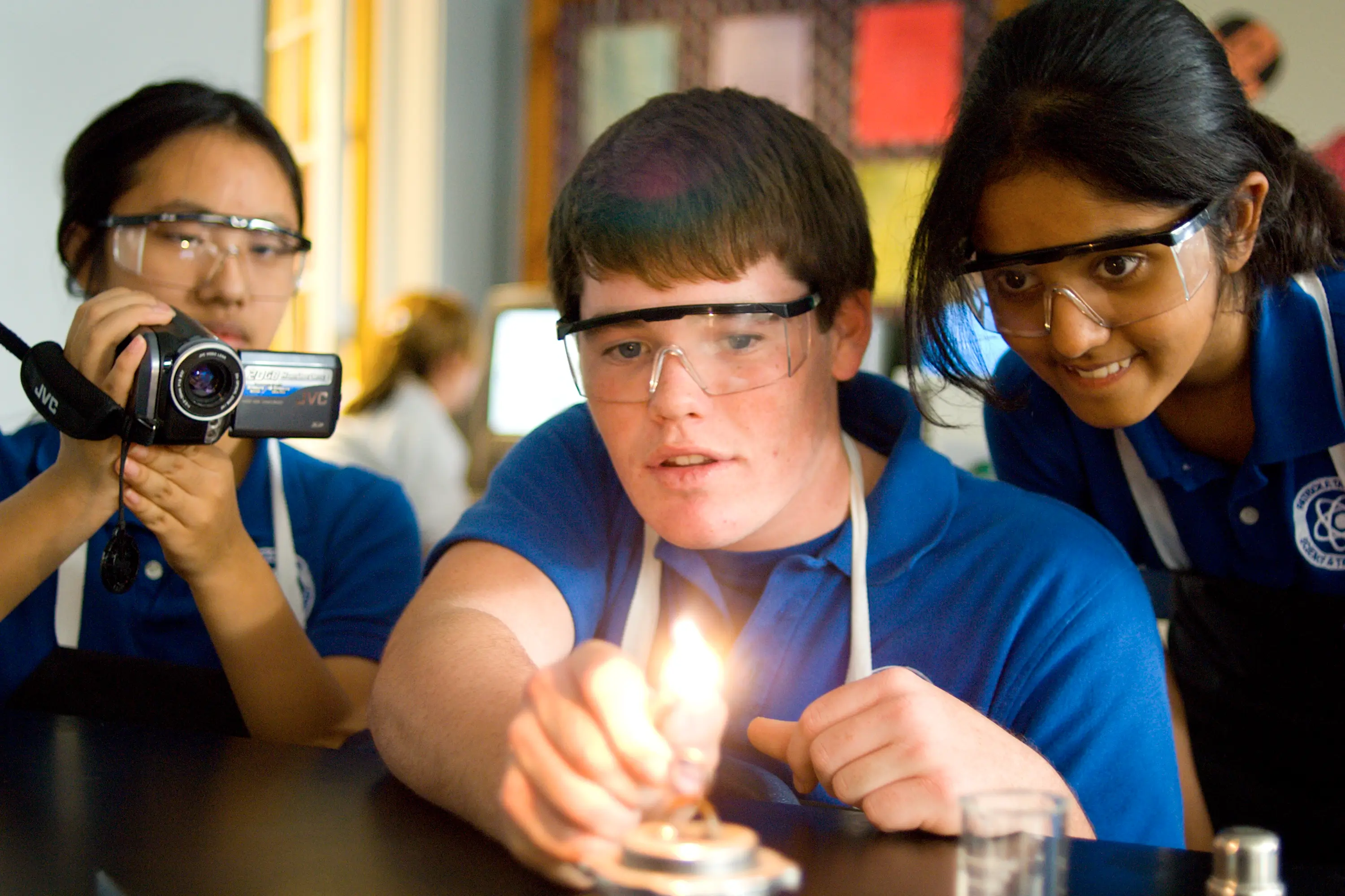Students recording a lesson with fire